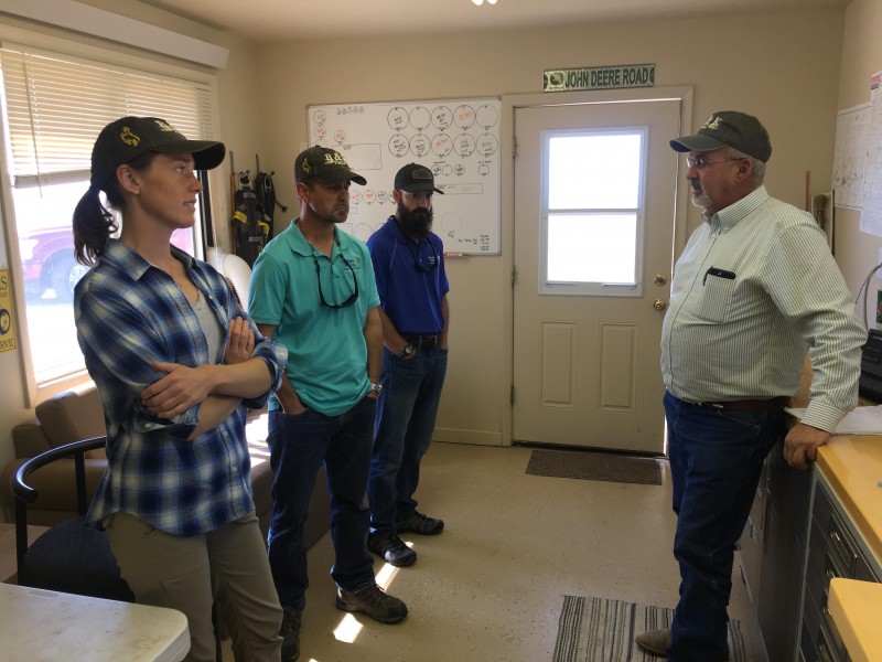 Hailey and Frank with the farmer